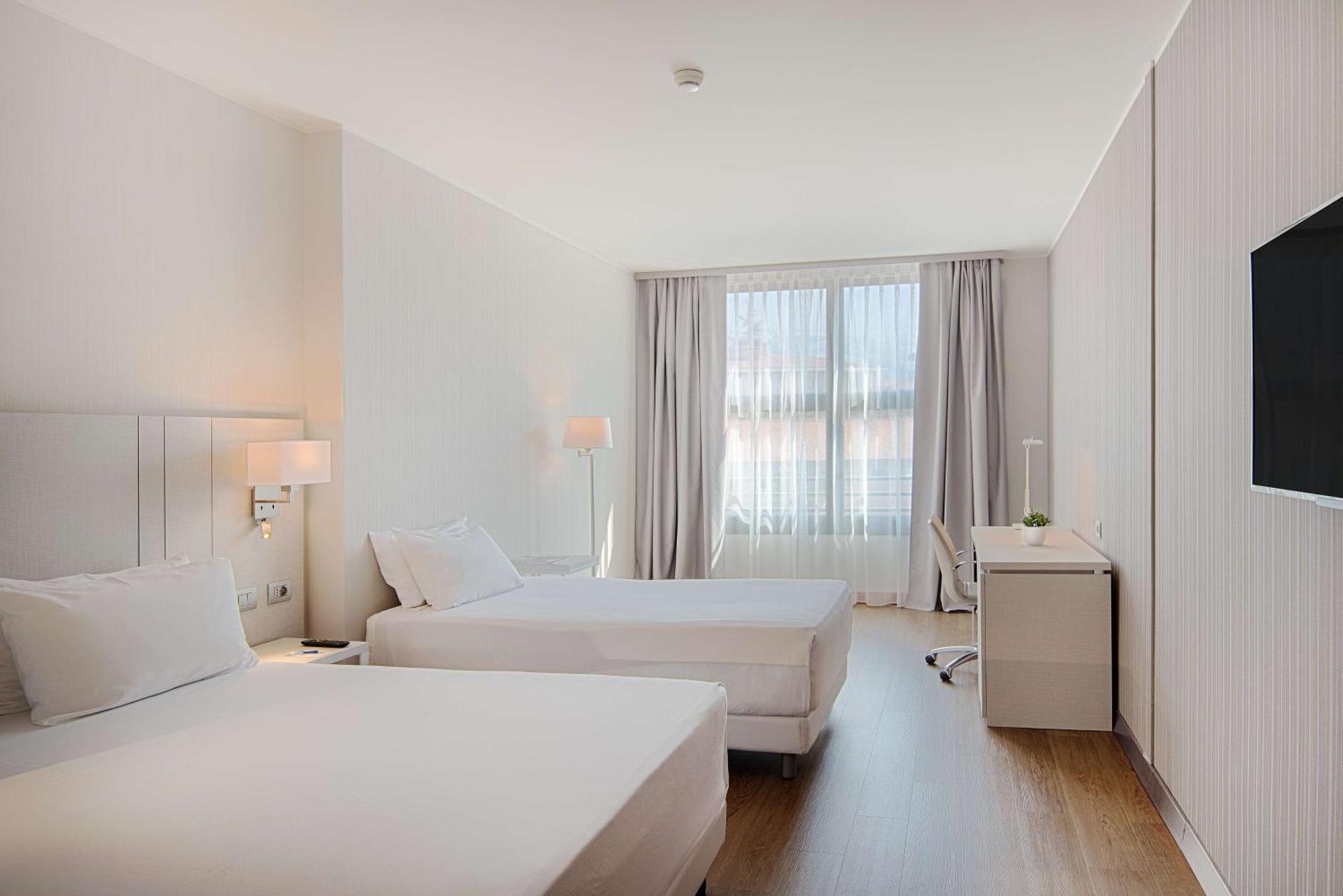 Habitación Familiar Comunicada (3 adultos + 1 niño)
